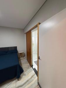 Postel nebo postele na pokoji v ubytování Vieiras + 3 fotografie