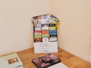 a box of books sitting on top of a table at Forest View in Peak Forest