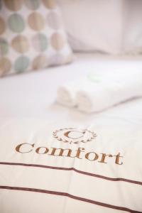 Letto o letti in una camera di Sun Guest House