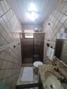 Koupelna v ubytování Quarto Aeroporto Galeão + 53 fotografií