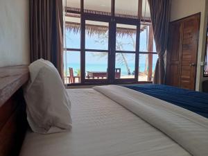 Postel nebo postele na pokoji v ubytování Tiger Hut