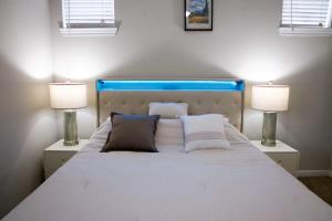 Voodi või voodid majutusasutuse Modern 1BR Retreat in the Heart of Magnolia toas