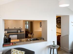 a kitchen with a sink and a counter at Walkers Retreat in Crook