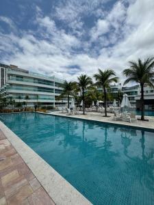 In Mare Bali 50 في بارناميريم: مسبح كبير بالنخيل ومبنى