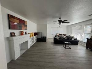 a living room with a couch and a fireplace at Reyes Guess home in Marysville