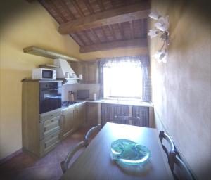 Kuchyň nebo kuchyňský kout v ubytování Agriturismo il Tiglio