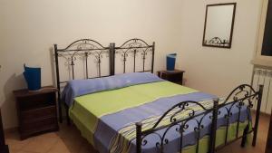 Säng eller sängar i ett rum på Casa Vacanze Salento