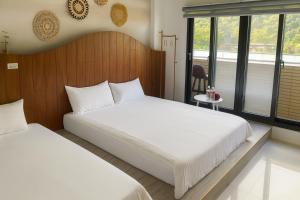 Postel nebo postele na pokoji v ubytování Blue Sea and Sunny B&B