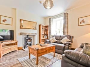 Et opholdsområde på Hillberry Cottage