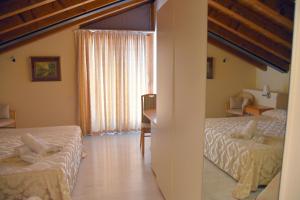 Ένα δωμάτιο στο Hotel Ristorante Miralago