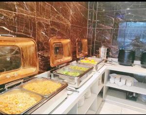 広州市にあるChaoman Hotel, Tianhe Sports Center, East Railway Station Subway Stationの台所