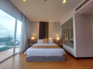 Ένα ή περισσότερα κρεβάτια σε δωμάτιο στο Luxury Residence Klong Muang Beach Front , Krabi +49 φωτογραφίες