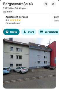 a screenshot of a building with cars parked in a parking lot at Helles Studio mit Terrasse nahe Therme und Park in Bad Säckingen +14 photos