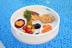 a model of a fruit and vegetables in a plastic container at Garden Centre Resort's in Atlāba