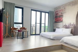 Ένα ή περισσότερα κρεβάτια σε δωμάτιο στο Blue Sea and Sunny B&B