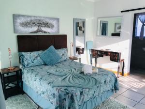 Ένα ή περισσότερα κρεβάτια σε δωμάτιο στο Sondela Bed and Breakfast +8 φωτογραφίες