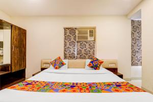 Katil atau katil-katil dalam bilik di FabExpress Travellers