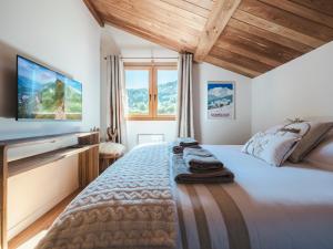 Ένα ή περισσότερα κρεβάτια σε δωμάτιο στο Chalet Zazen I Le Chalet Club