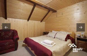 Postel nebo postele na pokoji v ubytování Садиба Над Прутом