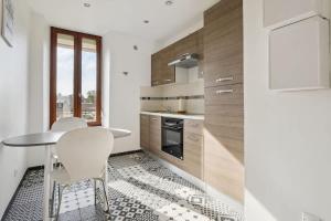 Η κουζίνα ή μικρή κουζίνα στο Cozy Studio avec Parking Charleville +7 φωτογραφίες