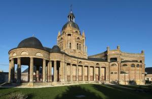 a large building with a tower on top of it at Cozy Studio avec Parking Charleville in Charleville-Mézières +8 photos