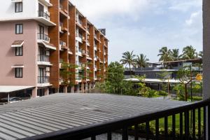 a view from the balcony of a building at Candolim Pearl - Luxurious 1 BHK Apartment by SoCH Stays in Nerul