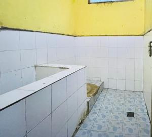 Ένα μπάνιο στο Costa Homestay