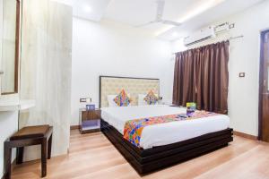 Ένα ή περισσότερα κρεβάτια σε δωμάτιο στο FabHotel The Sky +19 φωτογραφίες