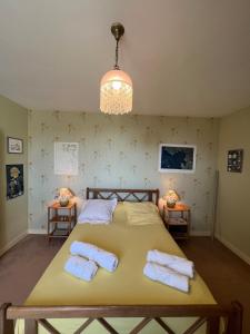 Postel nebo postele na pokoji v ubytování Fenêtres sur l'infini bleu- vue et accès mer