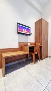 TV a/nebo společenská místnost v ubytování KRUSHNA Boarding And Lodging