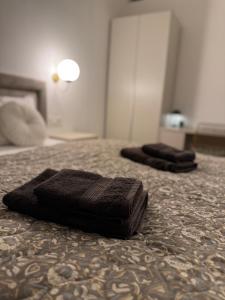 Postel nebo postele na pokoji v ubytování Belvedere Studio Apartman