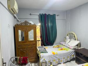 Postel nebo postele na pokoji v ubytování شاليه بقريه روجينا العين السخنه + 20 fotografií