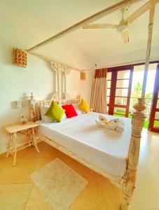 Katil atau katil-katil dalam bilik di Shanzu Oceanfront Apartments, La Mera