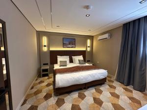 Ένα ή περισσότερα κρεβάτια σε δωμάτιο στο Venicia Hotel فندق فينيسيا +53 φωτογραφίες