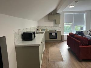 Η κουζίνα ή μικρή κουζίνα στο Apartment 3 Shipley +17 φωτογραφίες