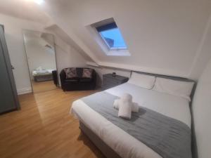 Ένα ή περισσότερα κρεβάτια σε δωμάτιο στο 4 Bed House