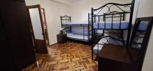 Ένα ή περισσότερα κρεβάτια σε δωμάτιο στο New Enjoy The Hostel