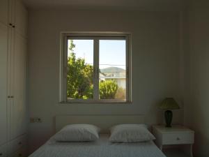 Ένα ή περισσότερα κρεβάτια σε δωμάτιο στο Villa Vericchio