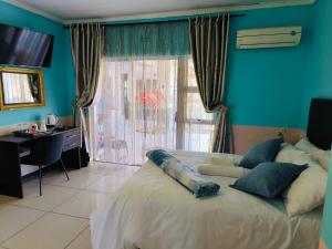 Katil atau katil-katil dalam bilik di La Paz Guesthouse +26 gambar