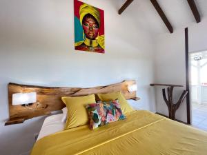 Ένα ή περισσότερα κρεβάτια σε δωμάτιο στο BEL BO Haut de villa vu mer et accès mer