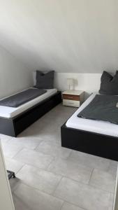 Ένα ή περισσότερα κρεβάτια σε δωμάτιο στο Privat Oasis, 10 min von Legoland