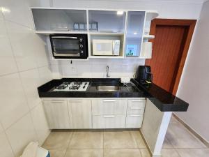 Dapur atau dapur kecil di Monte das Oliveiras - Alto da Pitinga em Arraial D'Ajuda