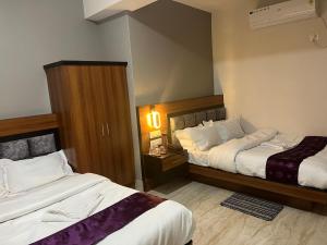 Postel nebo postele na pokoji v ubytování Park and Eat + 8 fotografií