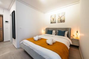 Katil atau katil-katil dalam bilik di Hills Residence - Studio with Balcony & Parking