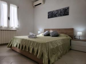 Postel nebo postele na pokoji v ubytování La Casetta di GioGiò