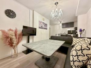 Posezení v ubytování mikiHOTEL本川町303