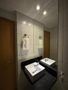 Koupelna v ubytování Apartamento à beira-mar