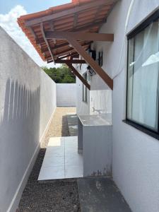 Φωτογραφία από το άλμπουμ του Casa Confortável em condomínio σε Macapa