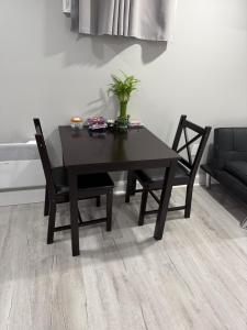Ruang duduk di JFK Private Studio Apartment +2 gambar
