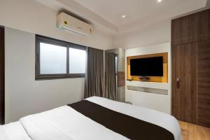 Postel nebo postele na pokoji v ubytování Hotel O The Faam